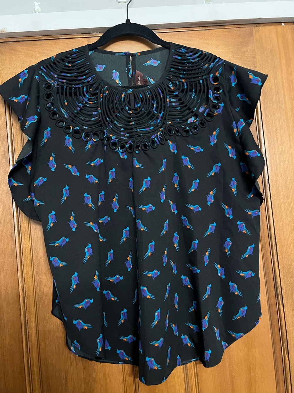 Airy top with beautiful lace and colorful birds